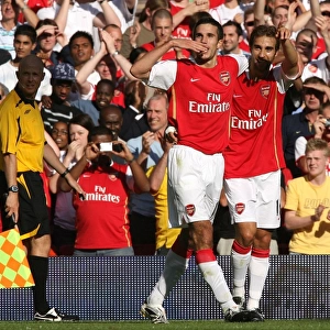 Robin van Perise (Arsenal) celebrates scoring Arsenals 2nd goal with Mathieu Flamini