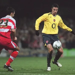 Robin van Perise (Arsenal) Steve Foster (Doncaster)