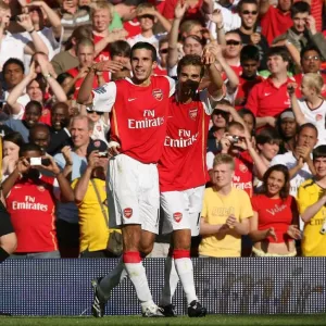 Robin van Perise celebrates scoring Arsenals 2nd goal with Mathieu Flamini Robin van Perise celebrates scoring Arsenals 2nd goal with Mathieu Flamini