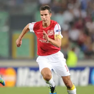 Robin van Persie in Action: Arsenal vs. Udinese, UEFA Champions League Play-Off, 2011 Robin van Persie in Action: Arsenal vs. Udinese, UEFA Champions League Play-Off, 2011