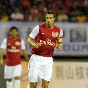 Robin van Persie in Action: Arsenal vs Hangzhou Greentown, China, 2011 Robin van Persie in Action: Arsenal vs Hangzhou Greentown, China, 2011