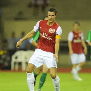 Robin van Persie in Action: Arsenal vs Hangzhou Greentown, China, 2011 Robin van Persie in Action: Arsenal vs Hangzhou Greentown, China, 2011
