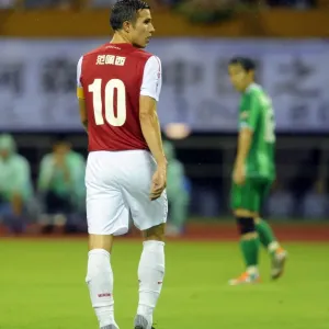 Robin van Persie in Action: Arsenal vs Hangzhou Greentown, China, 2011 Robin van Persie in Action: Arsenal vs Hangzhou Greentown, China, 2011