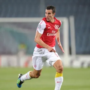 Robin van Persie in Action: Arsenal's Star Striker Against Udinese Calcio, UEFA Champions League 2011-12 Robin van Persie in Action: Arsenal's Star Striker Against Udinese Calcio, UEFA Champions League 2011-12
