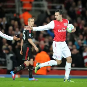 Robin van Persie and Alex Oxlade-Chamberlain: Arsenal's Unstoppable Duo Celebrates 3:0 Over AC Milan in UEFA Champions League Robin van Persie and Alex Oxlade-Chamberlain: Arsenal's Unstoppable Duo Celebrates 3:0 Over AC Milan in UEFA Champions League
