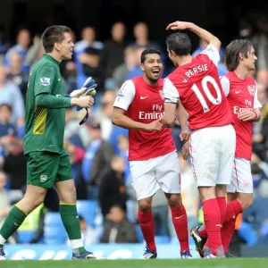 Robin van Persie, Andre Santos and Wojciech Szczesny (Arsenal) celebrate after the match