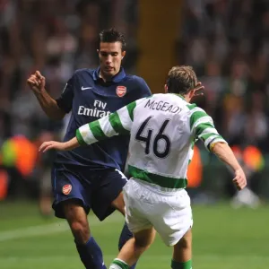 Robin van Persie (Arsenal) Aiden McGready (Celtic) Robin van Persie (Arsenal) Aiden McGready (Celtic)