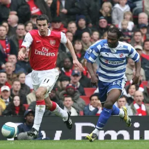 Robin van Persie (Arsenal) Andre Bikey (Reading)