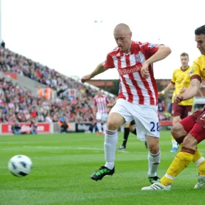 Robin van Persie (Arsenal) Andy Wilkinson (Stoke). Stoke City 3: 1 Arsenal