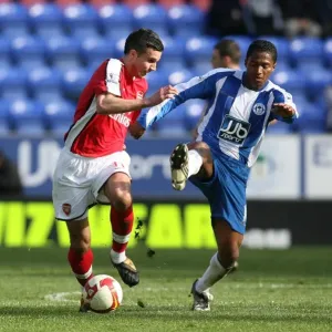 Robin van Persie (Arsenal) Antiono Valencia (Wigan) Robin van Persie (Arsenal) Antiono Valencia (Wigan)