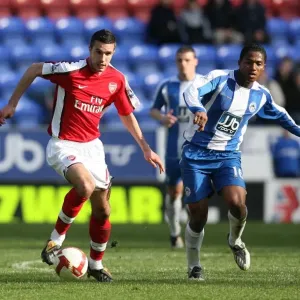 Robin van Persie (Arsenal) Antonio Valencia (Wigan) Robin van Persie (Arsenal) Antonio Valencia (Wigan)