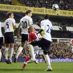 Robin van Persie (Arsenal) bends a free kick round the Tottenham wall. Tottenham Hotspur 2