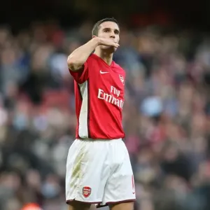 Robin van Persie (Arsenal) blows a kiss to his family after the match