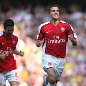 Robin van Persie (Arsenal) celebrates scoring his first goal Robin van Persie (Arsenal) celebrates scoring his first goal