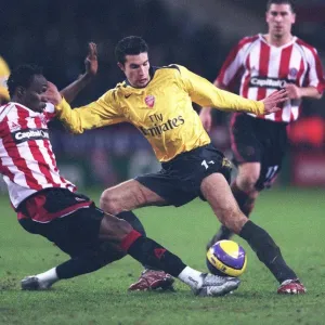 Robin van Persie (Arsenal) Claude Davis (Sheff Utd) Robin van Persie (Arsenal) Claude Davis (Sheff Utd)
