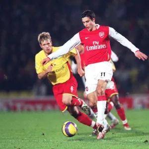 Robin van Persie (Arsenal) Jay Demerit (Watford)