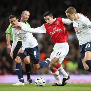 Robin van Persie (Arsenal) Jermaine Jenas and Michael Dawson (Tottenham)