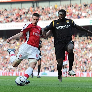 Robin van Persie (Arsenal) Kolo Toure (Man City). Arsenal 0: 0 Manchester City