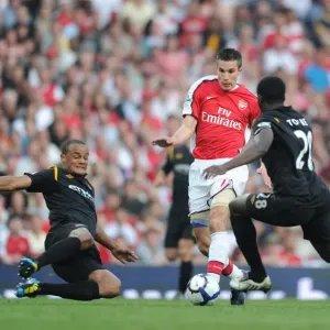 Robin van Persie (Arsenal) Kolo Toure and Vincent Kompany (Man City). Arsenal 0