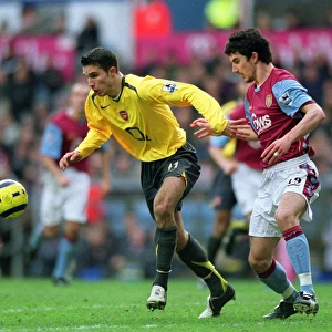 Robin van Persie (Arsenal) Liam Ridgewell (Villa). Aston Villa 0: 0 Arsenal