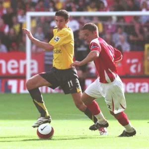 Robin van Persie (Arsenal) Luke Young (Charlton Athletic)