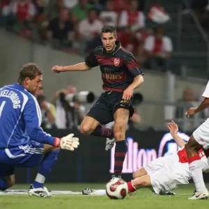 Robin van Persie (Arsenal) Maarten Stekelenburg and Colin (Ajax) Robin van Persie (Arsenal) Maarten Stekelenburg and Colin (Ajax)