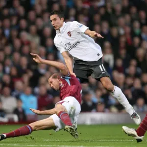 Robin van Persie (Arsenal) Matthew Upson (West Ham)