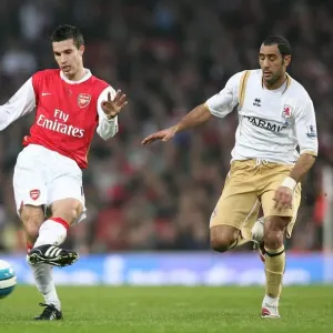Robin van Persie (Arsenal) Mohamed Shawky (Middlesbrough)