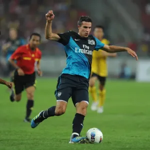 Print of Robin van Persie in action for Arsenal against Malaysia XI Print of Robin van Persie in action for Arsenal against Malaysia XI