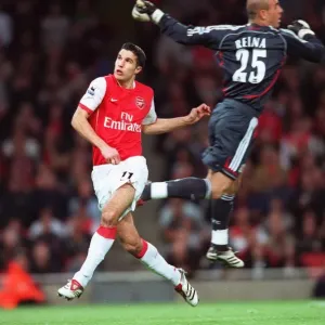 Robin van Persie (Arsenal) Pep Reina (Liverpool)