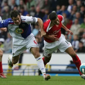 Robin van Persie (Arsenal) is pulled back by Blackburn defender Ryan Nelson