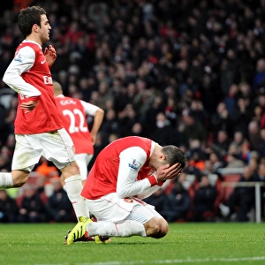 Robin van Persie (Arsenal) reacts to missing from the penalty spot. Arsenal 3