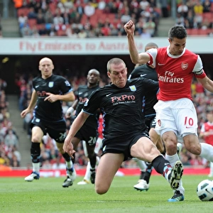 Robin van Persie (Arsenal) Richard Dunne (Villa). Arsenal 1: 2 Aston Villa