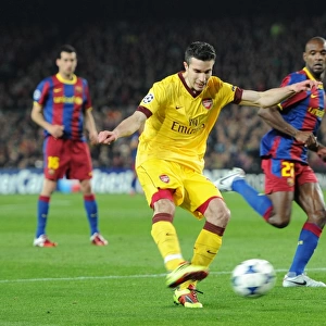 Robin van Persie (Arsenal) shoots for goal after the referee has blown his whistle earning a 2nd yellow card. Barcelona 3: 1 Arsenal. UEFA Champions League. Last 16, 2nd leg. Camp Nou, Barcelona, 8 / 3 / 11. Credit : Arsenal Football Club /