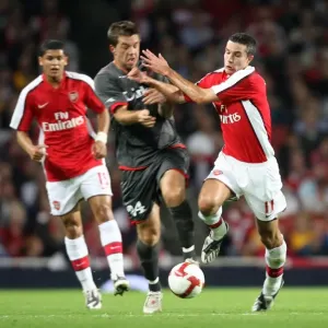 Robin van Persie (Arsenal) Theo Janssen (FC Twente)