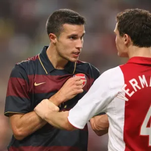Robin van Persie (Arsenal) Thomas Vermaelen (Ajax) Robin van Persie (Arsenal) Thomas Vermaelen (Ajax)
