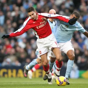 Robin van Persie (Arsenal) Vincent Kompany (Man City)