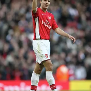 Robin van Persie (Arsenal) waves to his family after the match