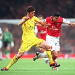 Robin van Persie (Arsenal) Xabi Alonso (Liverpool)