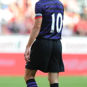 Robin van Persie: Arsenal's Star Striker Shines in Pre-Season Friendly Against FC Cologne, 2012