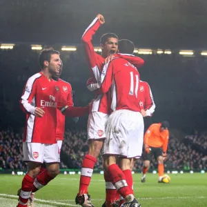 Robin van Persie celebrates scoring the 1st Arsenal