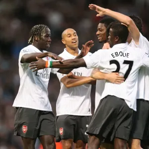 Robin van Persie celebrates scoring the 1st Arsenal
