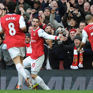 Robin van Persie celebrates scoring the 1st Arsenal goal with Gael Clichy and Samir Nasri