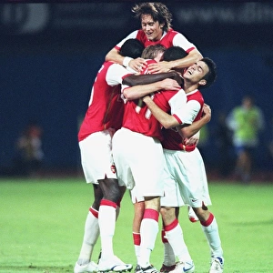 Robin van Persie celebrates scoring the 2nd Arsenal goal with Cesc Fabregas