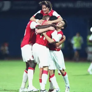 Robin van Persie celebrates scoring the 2nd Arsenal goal with Cesc Fabregas Robin van Persie celebrates scoring the 2nd Arsenal goal with Cesc Fabregas