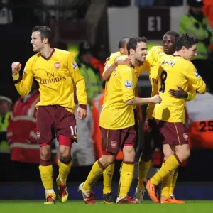 Robin van Persie celebrates scoring his 2nd goal Arsenals 3rd with his team mates