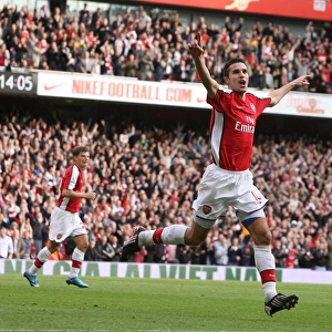 Robin van Persie celebrates scoring the 3rd Arsenal goal