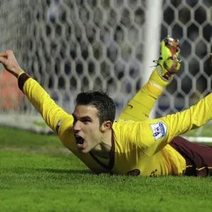 Robin van Persie celebrates scoring the 3rd Arsenal goal. Leeds United 1: 3 Arsenal