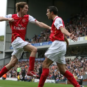 Robin van Persie celebrates scoring the Arsenal goal with Alex Hleb