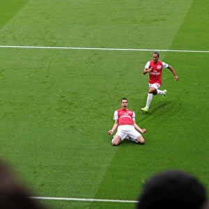 Robin van Persie celebrates scoring Arsenals 1st goal with Theo Walcott